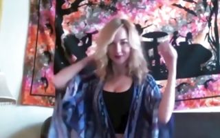 Lovely blonde poses in homemade xxx video rubbing tits